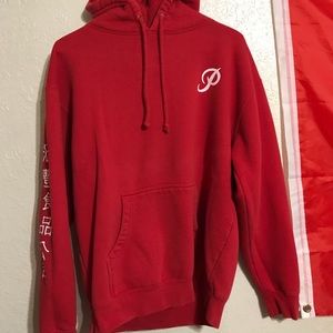 red “primitive” hoodie